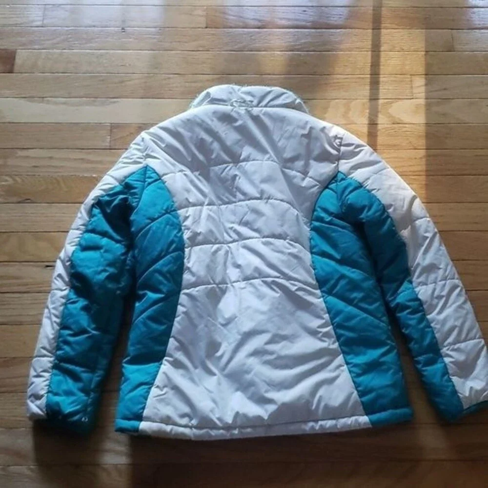 Girls winter Jacket size 14/16. White with green trim.